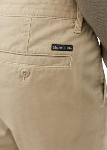 Stig shaped fit, shaped leg, regular length, welt pockets